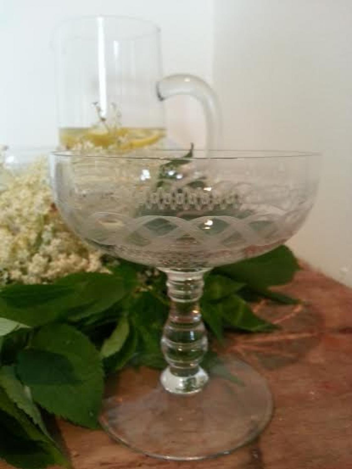 Set of 8 Engraved Crystal Champagne saucers