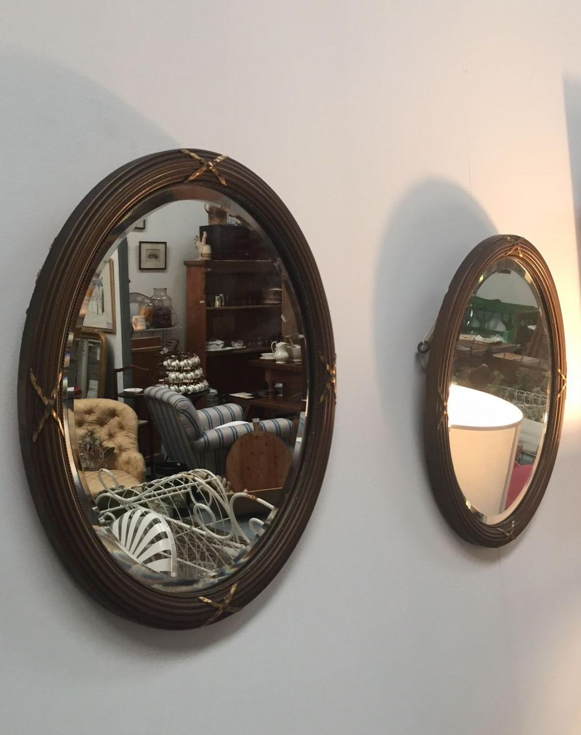 Pair of Edwardian Oval Bevelled Mirrors