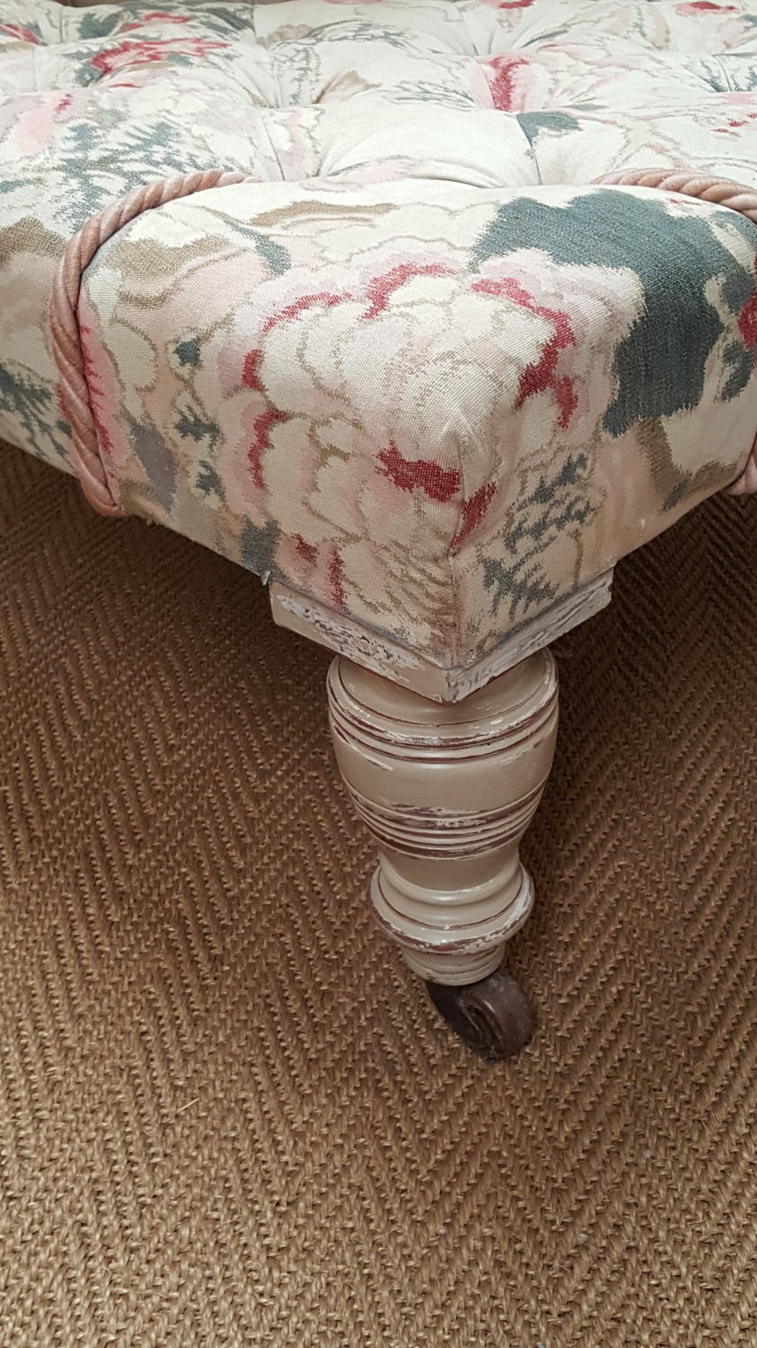Vintage upholstered footstool