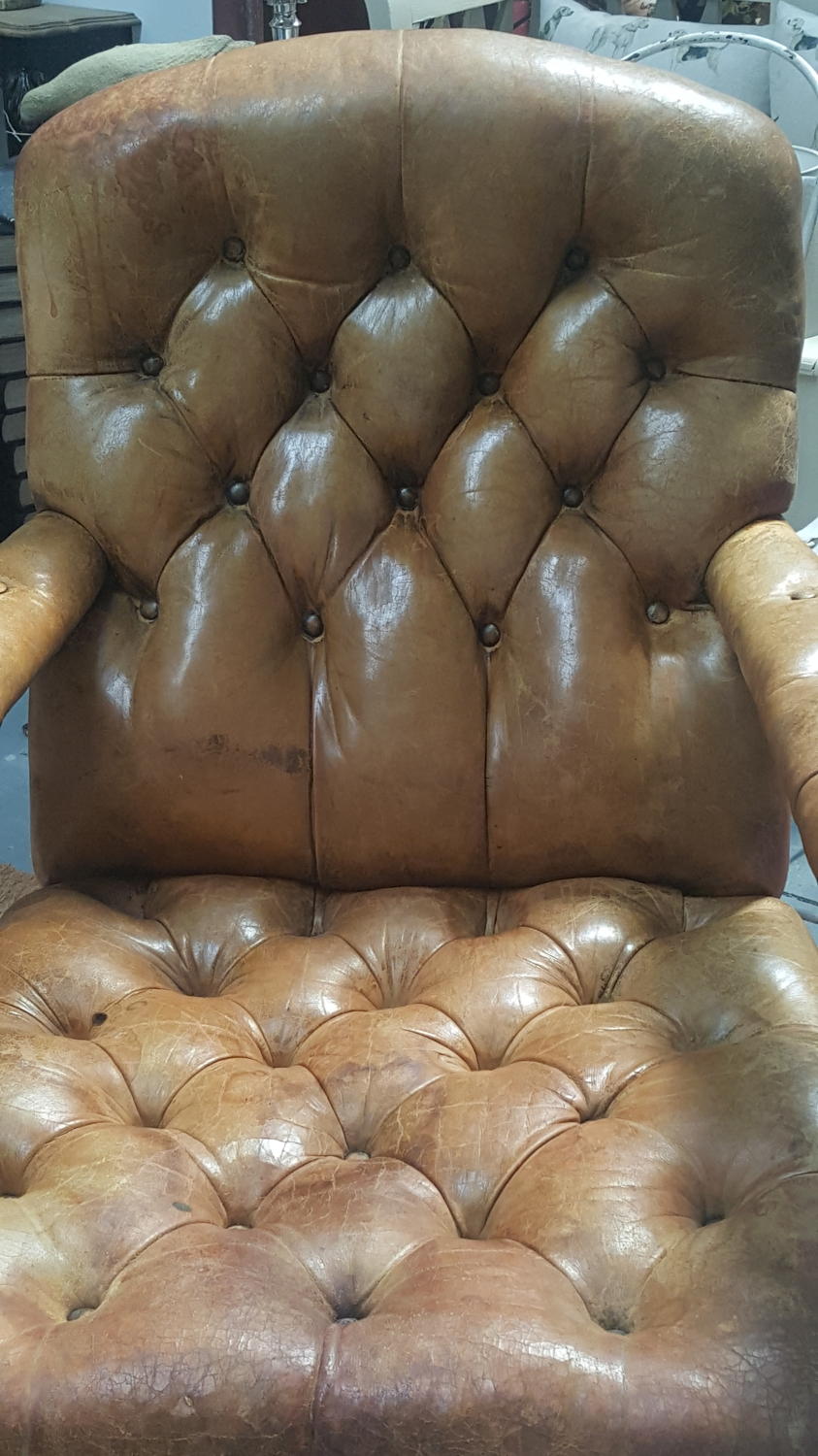 Vintage deep buttoned leather library chair