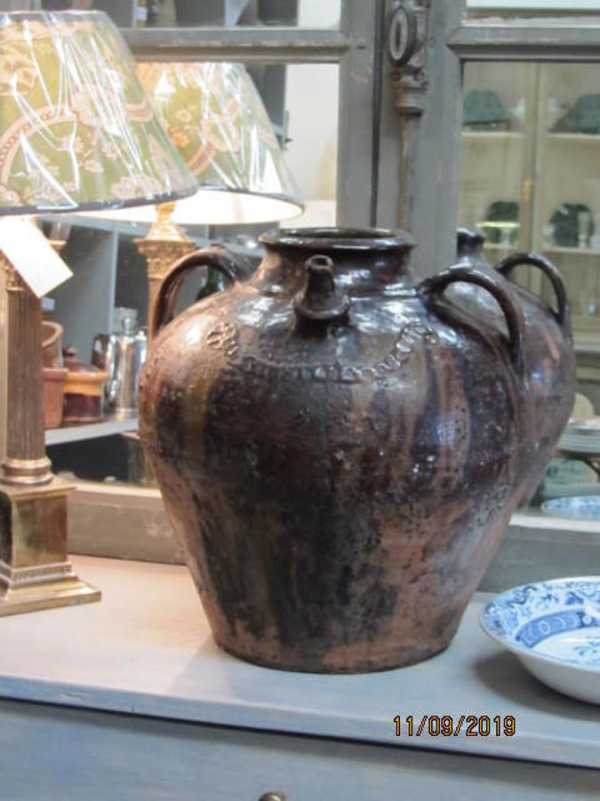 Antique French walnut oil jar