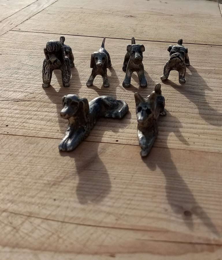 Vintage French pewter dog knife rests