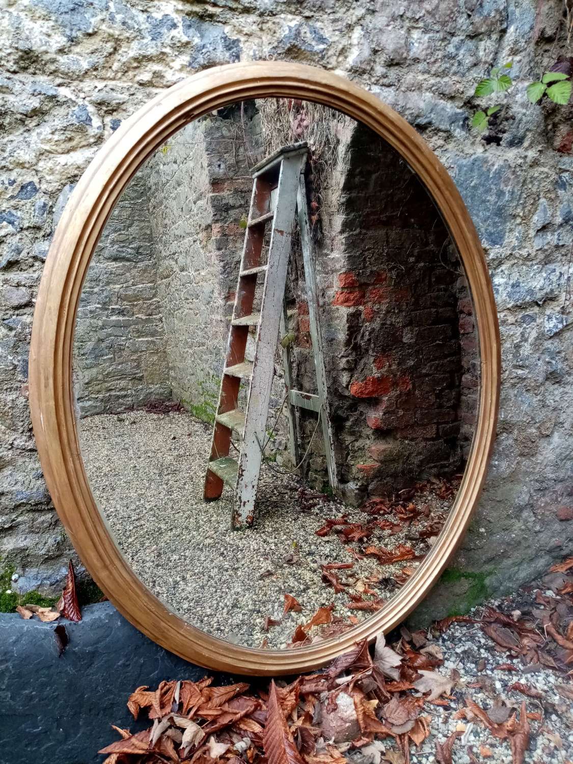 Large 19th c giltwood oval mirror