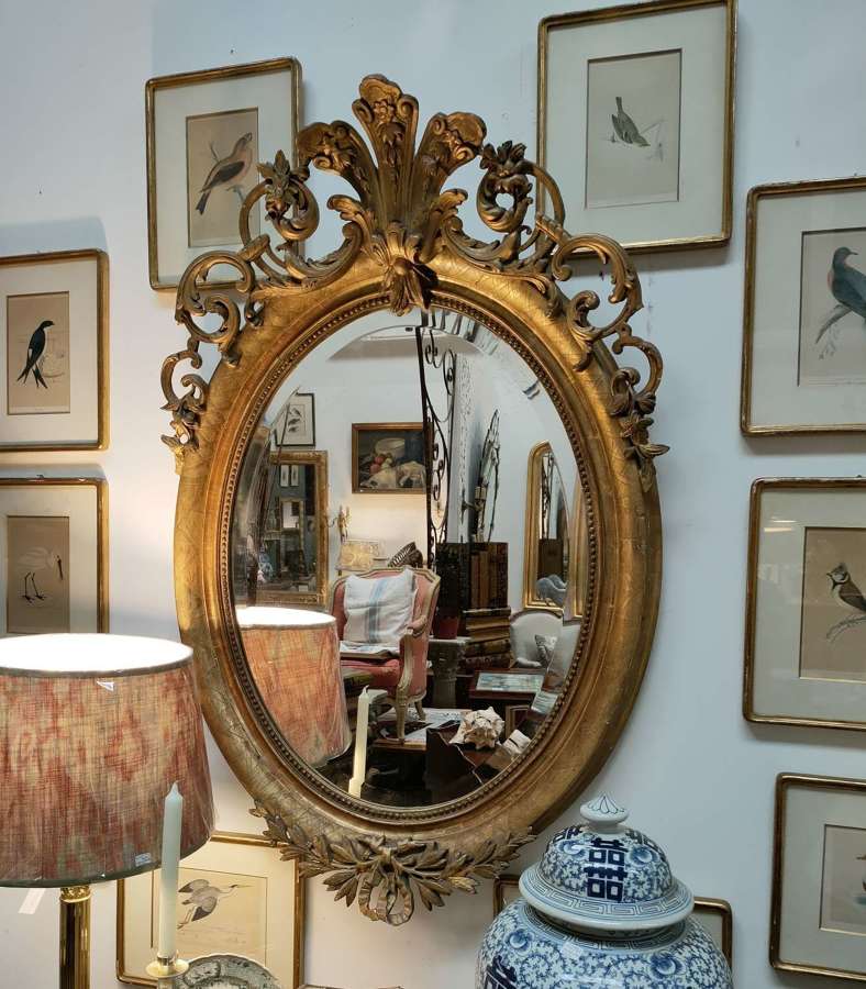 French Louis Philippe oval gilt mirror