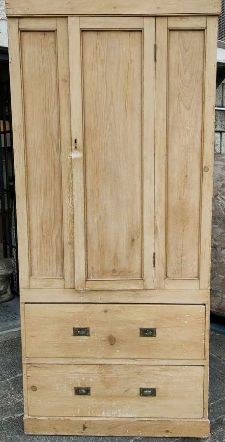 19th century pine wardrobe over two drawers