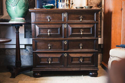 17th century style oak geometric chest on bun feet