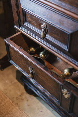 17th century style oak geometric chest on bun feet