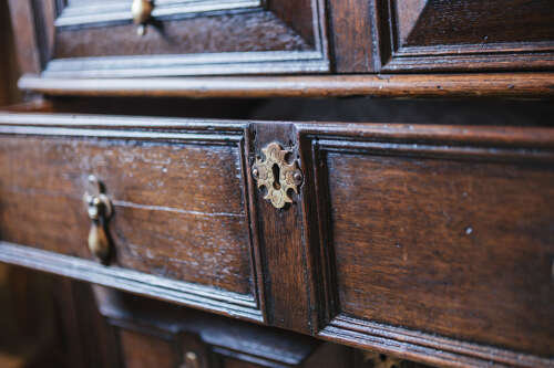 17th century style oak geometric chest on bun feet