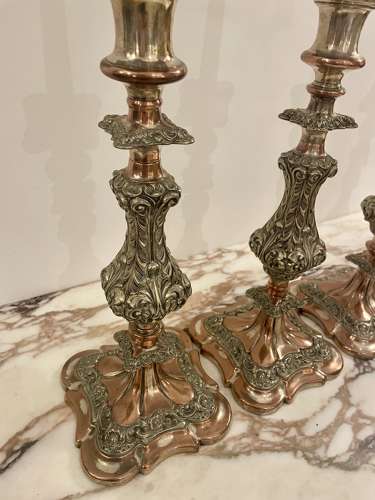 Set of four 19th century silver plated on copper candle sticks