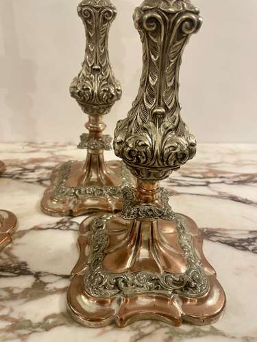 Set of four 19th century silver plated on copper candle sticks