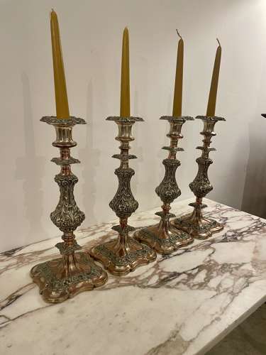Set of four 19th century silver plated on copper candle sticks