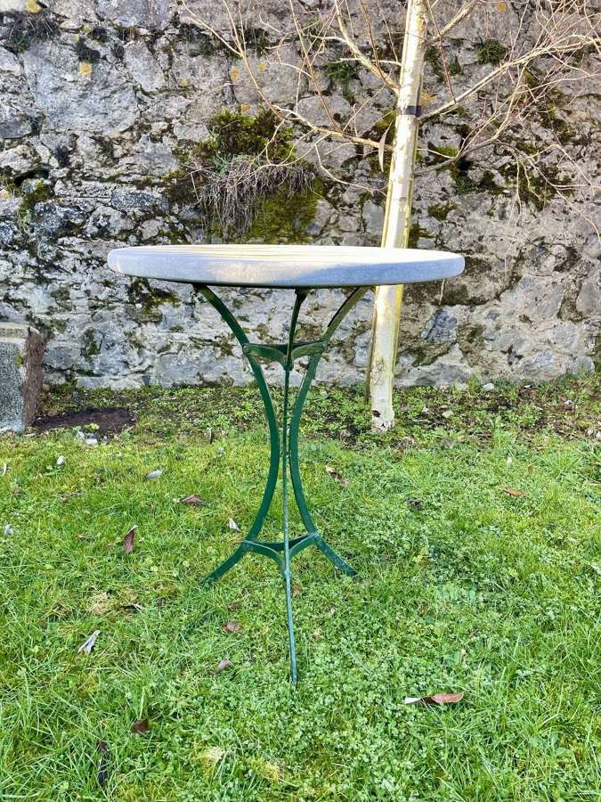 Limestone top bistro table on antique french base
