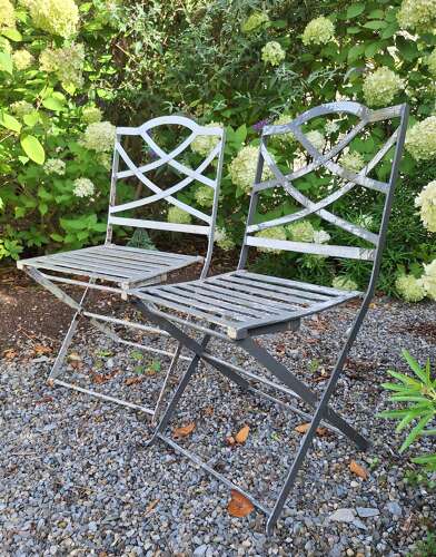 Pair of heavy folding French garden chairs