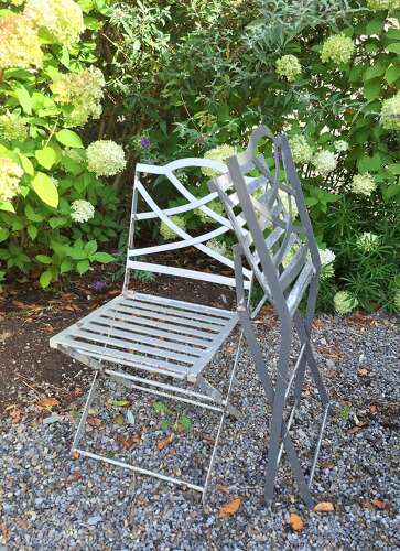 Pair of heavy folding French garden chairs