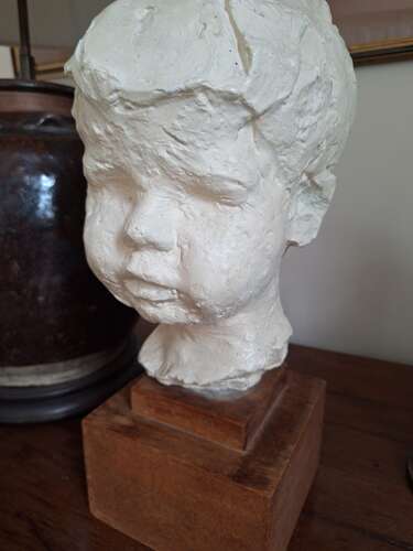 1930's plaster head of a child on wooden base