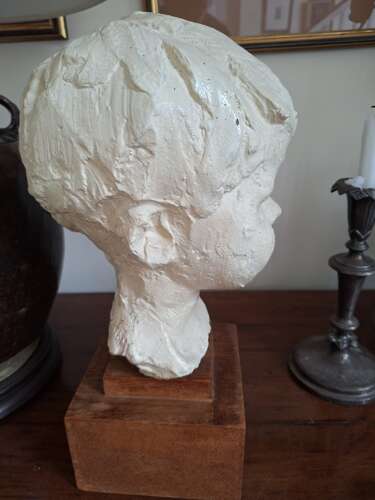 1930's plaster head of a child on wooden base