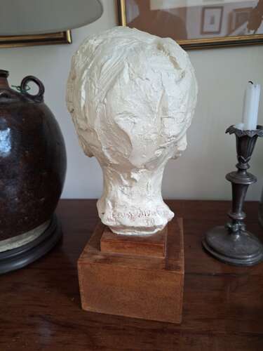 1930's plaster head of a child on wooden base