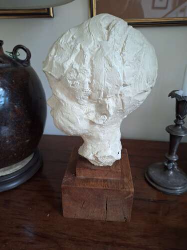 1930's plaster head of a child on wooden base