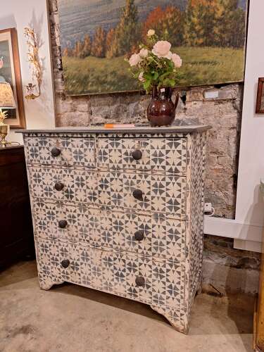 Antique pine chest of drawers with later painted geometric pattern