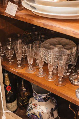 Large selection of antique glassware